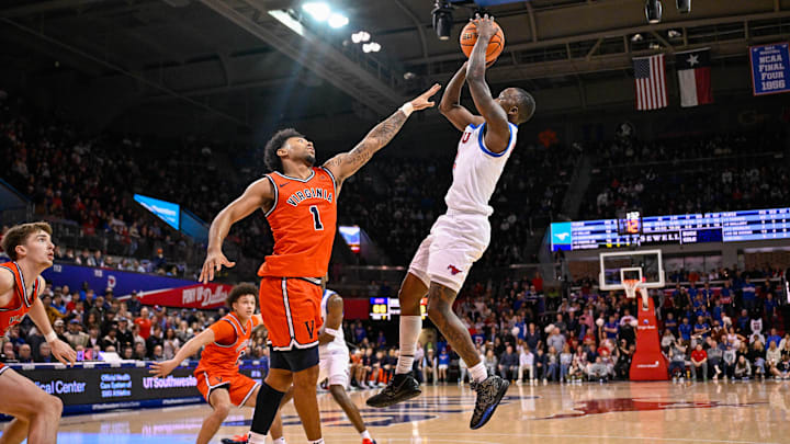 Jan 17, 2026; Dallas, Texas, USA; SMU Mustangs guard Boopie Miller (2) shoots the ball over Virginia Cavaliers guard Malik Thomas (1) during the second half at Moody Coliseum. Mandatory Credit: Jerome Miron-Imagn Images Jan 17, 2026; Dallas, Texas, USA; SMU Mustangs guard Boopie Miller (2) shoots the ball over Virginia Cavaliers guard Malik Thomas (1) during the second half at Moody Coliseum. Mandatory Credit: Jerome Miron-Imagn Images