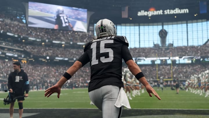 Sep 22, 2024; Paradise, Nevada, USA; Las Vegas Raiders quarterback Gardner Minshew (15) enters the field before the game against the Carolina Panthers at Allegiant Stadium. Mandatory Credit: Kirby Lee-Imagn Images