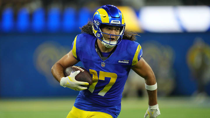 Nov 11, 2024; Inglewood, California, USA; Los Angeles Rams wide receiver Puka Nacua (17) carries the ball against the Miami Dolphins at SoFi Stadium. Mandatory Credit: Kirby Lee-Imagn Images