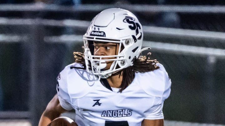 Racine St. Catherine's Lamont Hamilton (7) returns a punt 70 yards for a touchdown during the game at Lake Country Lutheran in Hartland, Friday, Sept. 29, 2023. The play was called back due to multiple penalties. Racine St. Catherine's Lamont Hamilton (7) returns a punt 70 yards for a touchdown during the game at Lake Country Lutheran in Hartland, Friday, Sept. 29, 2023. The play was called back due to multiple penalties.