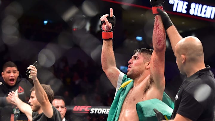 Aug 10, 2019; Montevideo, Uruguay; Vicente Luque (red gloves) reacts to fight against Mike Perry