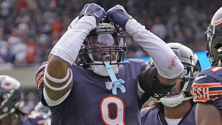 Sep 29, 2024; Chicago, Illinois, USA; Chicago Bears safety Jaquan Brisker (9) celebrates a defensive stop against the Los Angeles Rams during the second half at Soldier Field. Mandatory Credit: David Banks-Imagn Images