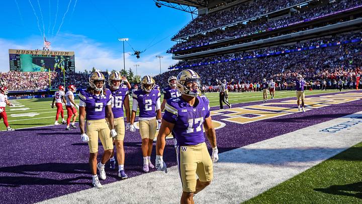 Jayden Limar celebrates his touchdown run late in the Apple Cup. Jayden Limar celebrates his touchdown run late in the Apple Cup.