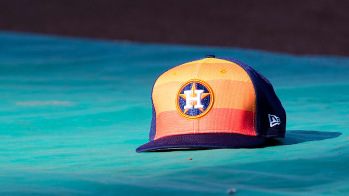 Apr 9, 2024; Kansas City, Missouri, USA; A general view of Houston Astros second base Jose Altuve (27) hat on the field during batting practice prior to a game against the Kansas City Royals at Kauffman Stadium.