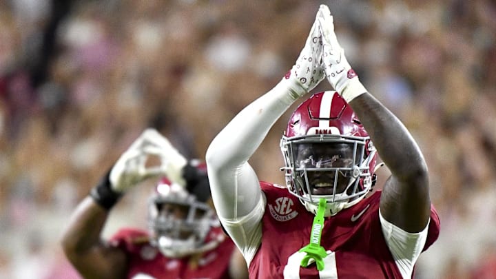 Alabama Crimson Tide linebacker Deontae Lawson (0) and defensive lineman Tim Keenan III (96)