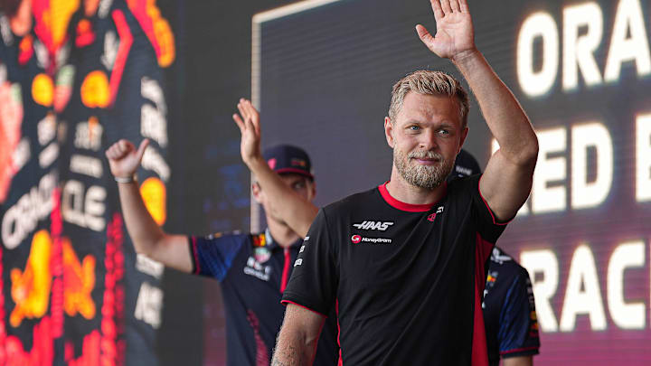 MoneyGram Haas driver Kevin Magnussen waves to the crowd as he leaves the stage during driver engagements in the Germania Insurance Amphitheater at Circuit of Americas on Saturday Oct. 21, 2023 ahead of the Formula 1 Lenovo United States Grand Prix on Sunday.
