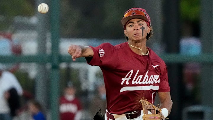 Alabama shortstop Justin Lebron (1) fields and throws to first for an out against Mississippi State at Sewell-Thomas Stadium in Tuscaloosa Friday, April 11, 2025.