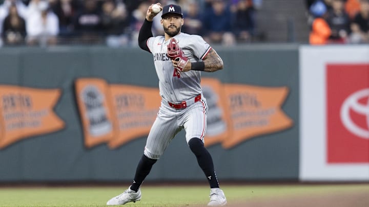 Jul 12, 2024; San Francisco, California, USA; Minnesota Twins shortstop Carlos Correa (4) throws to first base for an out against the San Francisco Giants during the fourth inning at Oracle Park.