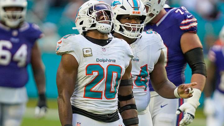 Miami Dolphins linebacker Jordyn Brooks and defensive tackle Jordan Phillips celebrate a fourth down stop against the Bills. Miami Dolphins linebacker Jordyn Brooks and defensive tackle Jordan Phillips celebrate a fourth down stop against the Bills.