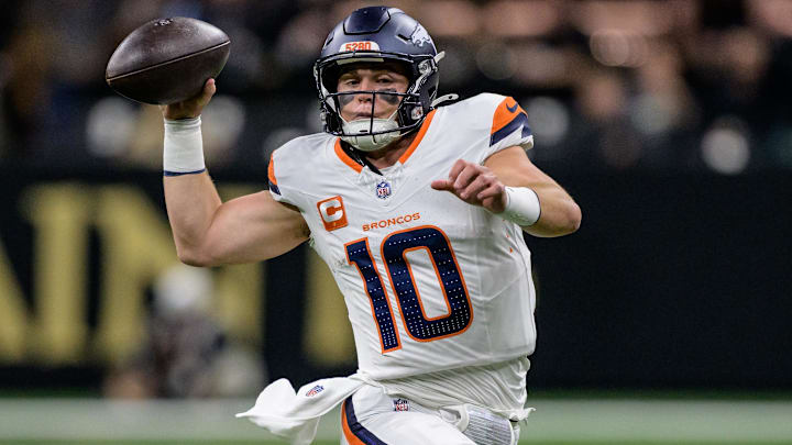 Oct 17, 2024; New Orleans, Louisiana, USA; Denver Broncos quarterback Bo Nix (10) throws during the first quarter against the New Orleans Saints at Caesars Superdome. Mandatory Credit: Matthew Hinton-Imagn Images