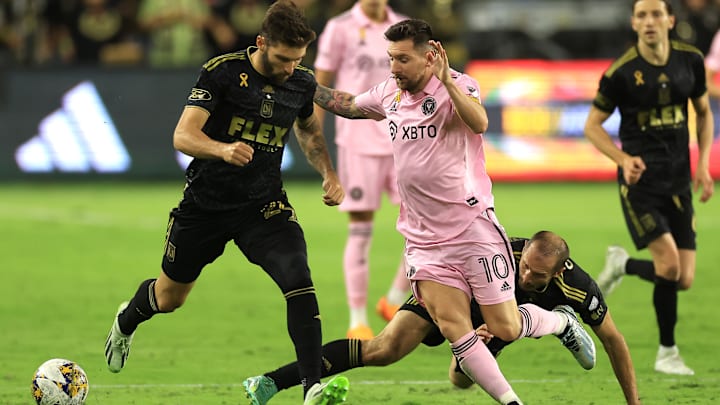 Inter Miami's Lionel Messi works around Los Angeles FC defender Ryan Hollingshead in a recent MLS match.