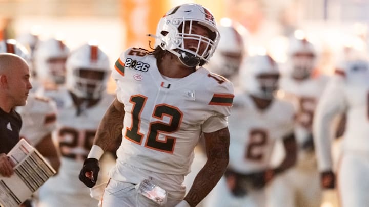 Jan 19, 2026; Miami Gardens, FL, USA; Miami Hurricanes defensive lineman Marquise Lightfoot (12) against the Indiana Hoosiers during the College Football Playoff National Championship game at Hard Rock Stadium. Mandatory Credit: Mark J. Rebilas-Imagn Images