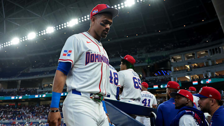 Julio Rodriguez (44) enters the dugout before the game against the Netherlands.