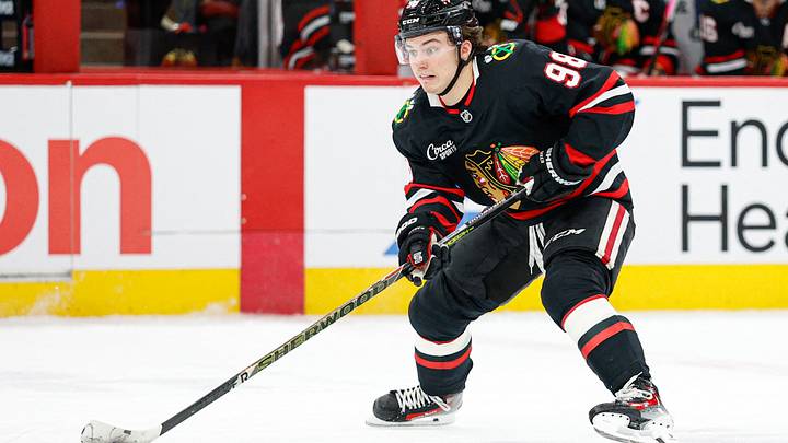 Jan 23, 2026; Chicago, Illinois, USA; Chicago Blackhawks center Connor Bedard (98) looks to pass the puck against the Tampa Bay Lightning during the first period at United Center. Mandatory Credit: Kamil Krzaczynski-Imagn Images