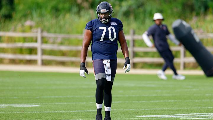 Chicago Bears offensive tackle Braxton Jones (70) walks on the field during Training Camp at Halas Hall. Mandatory Credit: Kamil Krzaczynski-Imagn Images Chicago Bears offensive tackle Braxton Jones (70) walks on the field during Training Camp at Halas Hall. Mandatory Credit: Kamil Krzaczynski-Imagn Images