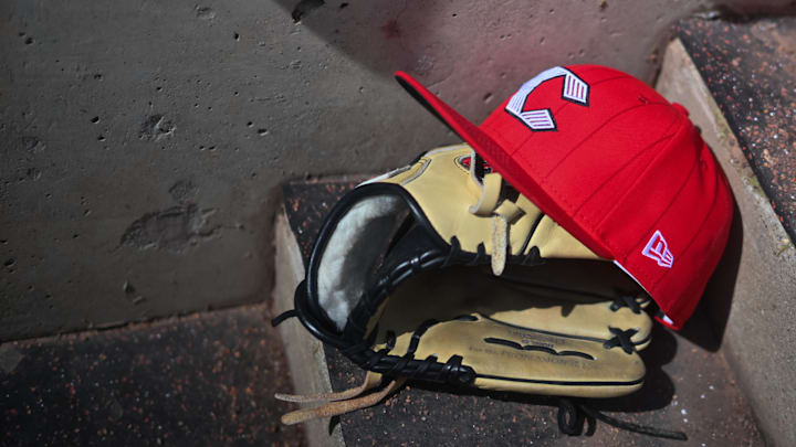 Apr 11, 2026; Cincinnati, Ohio, USA;  A view of an official Cincinnati Reds hat on the dugout steps during the game against the Los Angeles Angels at Great American Ball Park. Mandatory Credit: Aaron Doster-Imagn Images