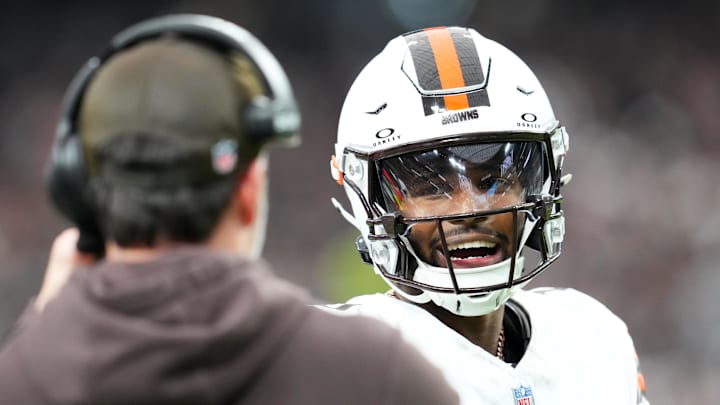 Nov 23, 2025; Paradise, Nevada, USA; Cleveland Browns quarterback Shedeur Sanders (12) talks to head coach Kevin Stefanski in the first half against the Las Vegas Raiders at Allegiant Stadium. Mandatory Credit: Stephen R. Sylvanie-Imagn Images