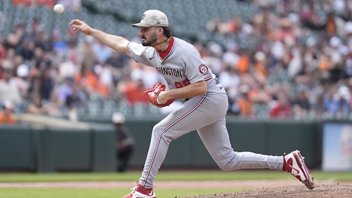 May 18, 2025; Baltimore, Maryland, USA; Washington Nationals pitcher Cole Henry (99) delivers a pitch against the Baltimore Orioles during the ninth inning at Oriole Park at Camden Yards.