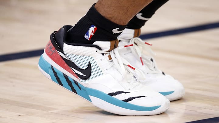 Memphis Grizzlies guard Ja Morant wears the Nike Ja 1 "Reverse Scratch" colorway.