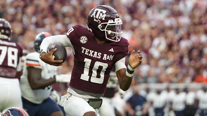 Aug 30, 2025; College Station, Texas, USA; Texas A&M Aggies quarterback Marcel Reed (10) runs with the football in the first quarter against the UTSA Roadrunners at Kyle Field. Mandatory Credit: Sean Thomas-Imagn Images