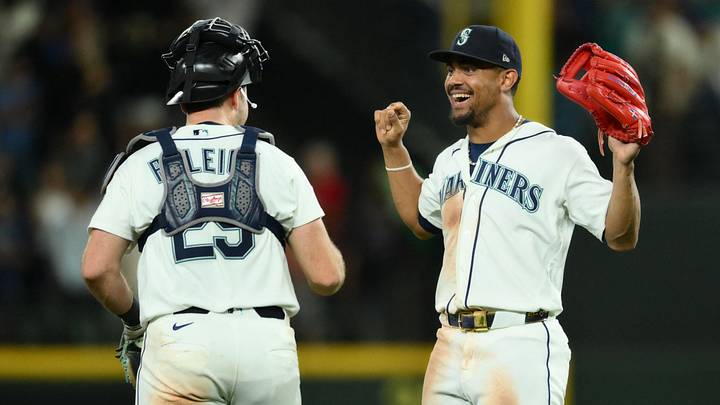 Aug 25, 2026; Seattle, Washington, USA; Seattle Mariners catcher Cal Raleigh (29) and center fielder Julio Rodriguez (44) celebrate defeatng the Philadelphia Phillies at T-Mobile Park. Mandatory Credit: Steven Bisig-Imagn Images Aug 25, 2026; Seattle, Washington, USA; Seattle Mariners catcher Cal Raleigh (29) and center fielder Julio Rodriguez (44) celebrate defeatng the Philadelphia Phillies at T-Mobile Park. Mandatory Credit: Steven Bisig-Imagn Images