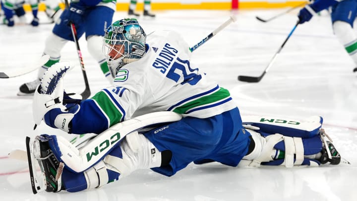 Apr 2, 2024; Las Vegas, Nevada, USA; Vancouver Canucks goaltender Arturs Silovs (31) warms up before a game against the Vegas Golden Knights at T-Mobile Arena. Mandatory Credit: Stephen R. Sylvanie-USA TODAY Sports