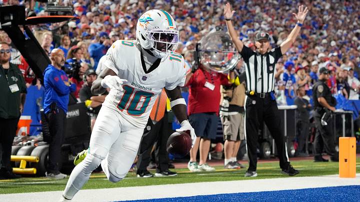 Sep 18, 2025; Orchard Park, New York, USA; Miami Dolphins wide receiver Tyreek Hill (10) scores a touchdown against the Buffalo Bills in the fourth quarter at Highmark Stadium. Mandatory Credit: Gregory Fisher-Imagn Images Sep 18, 2025; Orchard Park, New York, USA; Miami Dolphins wide receiver Tyreek Hill (10) scores a touchdown against the Buffalo Bills in the fourth quarter at Highmark Stadium. Mandatory Credit: Gregory Fisher-Imagn Images