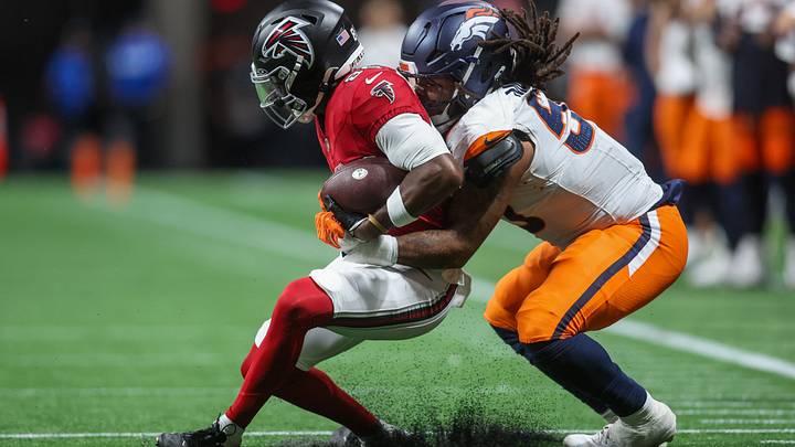 Aug 14, 2026; Atlanta, Georgia, USA; Atlanta Falcons wide receiver Keelan Marion (85) is tackled by Denver Broncos linebacker Red Murdock (50) in the second quater at Mercedes-Benz Stadium. Mandatory Credit: Brett Davis-Imagn Images Aug 14, 2026; Atlanta, Georgia, USA; Atlanta Falcons wide receiver Keelan Marion (85) is tackled by Denver Broncos linebacker Red Murdock (50) in the second quater at Mercedes-Benz Stadium. Mandatory Credit: Brett Davis-Imagn Images