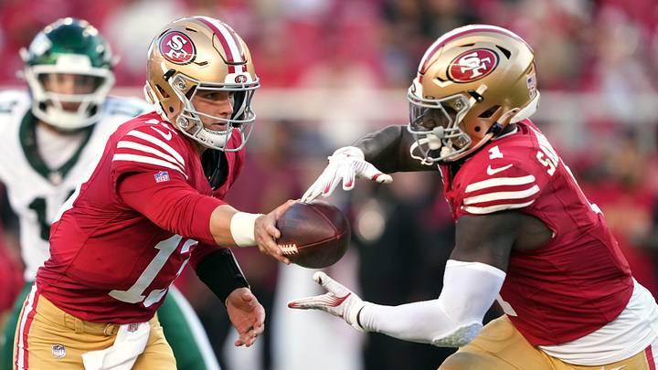 Sep 9, 2024; Santa Clara, California, USA; San Francisco 49ers quarterback Brock Purdy (left) hands off to wide receiver Deebo Samuel Sr. (right) during the second quarter against the New York Jets at Levi's Stadium. Mandatory Credit: Darren Yamashita-Imagn Images Sep 9, 2024; Santa Clara, California, USA; San Francisco 49ers quarterback Brock Purdy (left) hands off to wide receiver Deebo Samuel Sr. (right) during the second quarter against the New York Jets at Levi's Stadium. Mandatory Credit: Darren Yamashita-Imagn Images