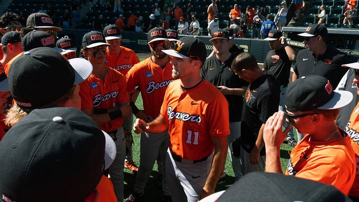 Oregon State head coach Mitch Canham, center, brings his team together after the win over Washington State on day three at the NCAA Eugene Regional Tournament at PK Park in Eugene May 31, 2026. Oregon State head coach Mitch Canham, center, brings his team together after the win over Washington State on day three at the NCAA Eugene Regional Tournament at PK Park in Eugene May 31, 2026.