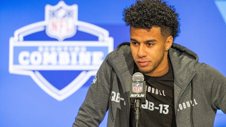 Mar 1, 2024; Indianapolis, IN, USA;  Florida State quarterback Jordan Travis (QB13) talks to the media during the 2024 NFL Combine at Lucas Oil Stadium. Mandatory Credit: Trevor Ruszkowski-Imagn Images