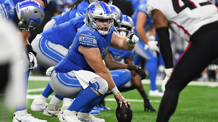 Former Lions center/guard Evan Brown checks the defensive alignment during a game in 2022. Brown is a Cardinals free agent.