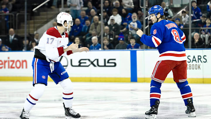 Nov 30, 2024; New York, New York, USA; Montreal Canadiens right wing Josh Anderson (17) and New York Rangers defenseman Jacob Trouba (8) fight during the first period at Madison Square Garden. Mandatory Credit: John Jones-Imagn Images Nov 30, 2024; New York, New York, USA; Montreal Canadiens right wing Josh Anderson (17) and New York Rangers defenseman Jacob Trouba (8) fight during the first period at Madison Square Garden. Mandatory Credit: John Jones-Imagn Images