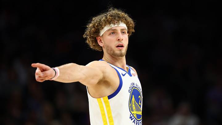 Dec 18, 2025; Phoenix, Arizona, USA; Golden State Warriors guard Brandin Podziemski (2) reacts against the Phoenix Suns in the second half at Mortgage Matchup Center. Mandatory Credit: Mark J. Rebilas-Imagn Images Dec 18, 2025; Phoenix, Arizona, USA; Golden State Warriors guard Brandin Podziemski (2) reacts against the Phoenix Suns in the second half at Mortgage Matchup Center. Mandatory Credit: Mark J. Rebilas-Imagn Images