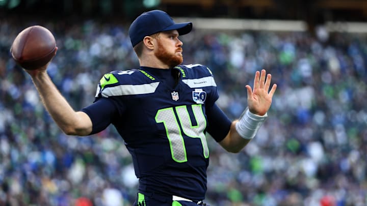 Seattle Seahawks quarterback Sam Darnold (14) passes against the Los Angeles Rams during the first half in the 2026 NFC Championship Game at Lumen Field. 