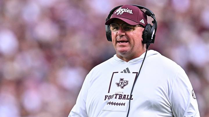 Texas A&M Aggies head coach Mike Elko walks onto the field during a time-out in the first quarter against the Missouri State Bears at Kyle Field. 