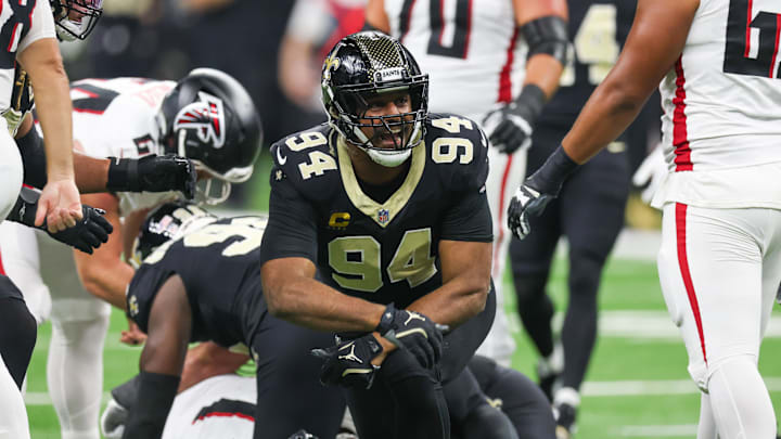 Nov 23, 2025; New Orleans, Louisiana, USA; New Orleans Saints defensive end Cameron Jordan (94) reacts after forcing a fumble against the Atlanta Falcons during the first half at Caesars Superdome. Mandatory Credit: Stephen Lew-Imagn Images