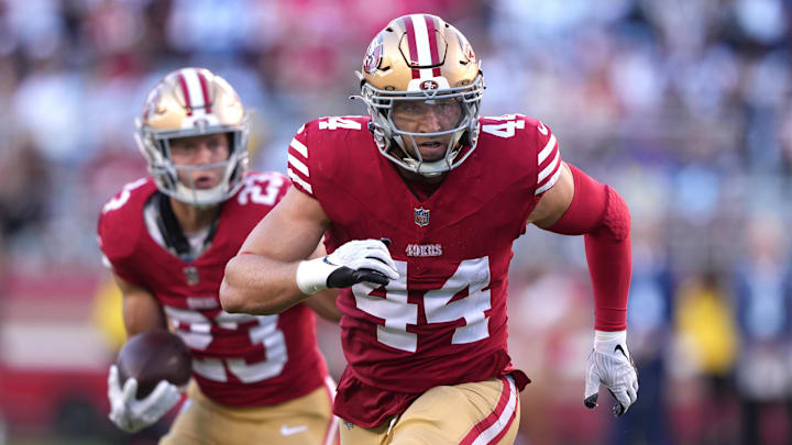 Oct 8, 2023; Santa Clara, California, USA; San Francisco 49ers fullback Kyle Juszczyk (44) blocks for running back Christian McCaffrey (23) during the first quarter against the Dallas Cowboys at Levi's Stadium. Mandatory Credit: Darren Yamashita-Imagn Images