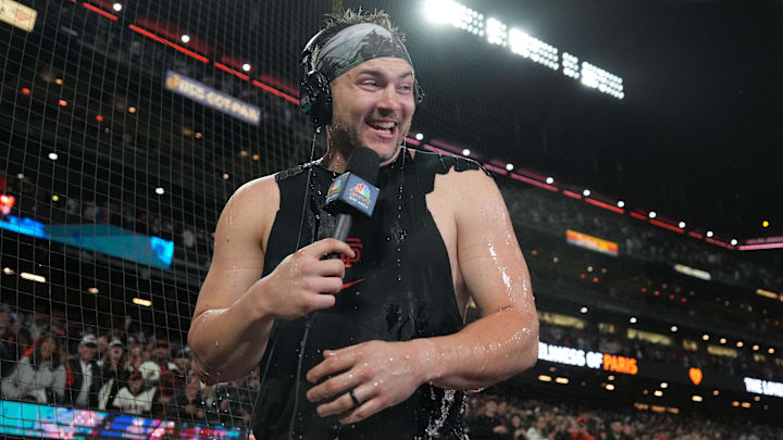 San Francisco Giants catcher Patrick Bailey (14) reacts after getting doused after defeating the Los Angeles Dodgers at Oracle Park. 