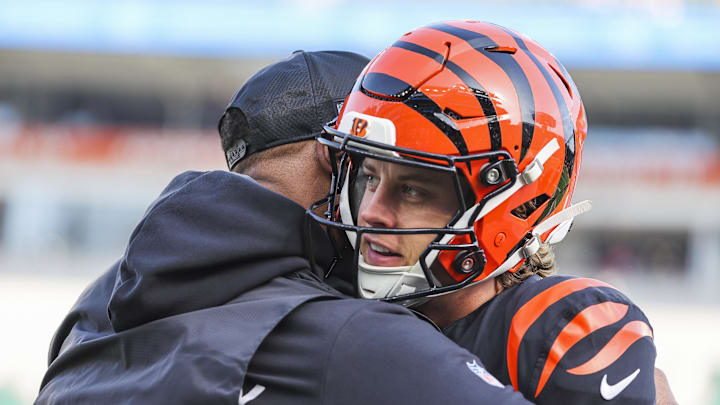 Jan 4, 2026; Cincinnati, Ohio, USA; Cincinnati Bengals quarterback Joe Burrow (9) takes a break from pregame warmups against the Cleveland Browns at Paycor Stadium. Mandatory Credit: Joseph Maiorana-Imagn Images