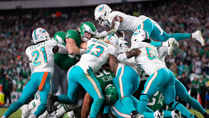 Philadelphia Eagles quarterback Jalen Hurts scores on a quarterback sneak on the one yard line against the Miami Dolphins during the second quarter at Lincoln Financial Field.