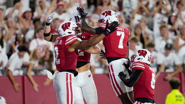 Sep 12, 2026; Madison, Wisconsin, USA;  Wisconsin Badgers cornerback Javan Robinson (2) celebrates with teammates after scoring a touchdown during the fourth quarter against the Western Illinois Leathernecks at Camp Randall Stadium. Mandatory Credit: Jeff Hanisch-Imagn Images