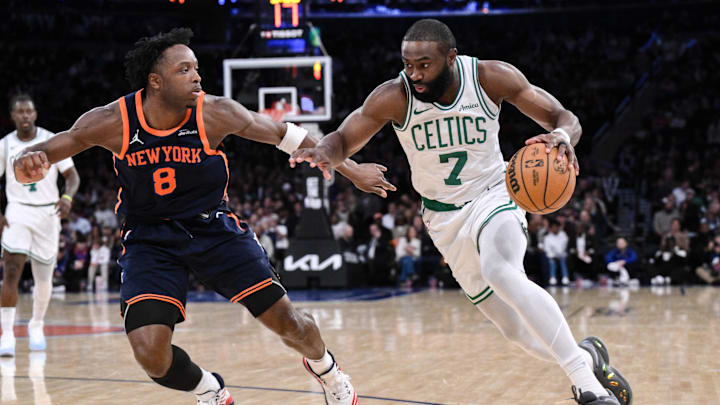 Apr 8, 2025; New York, New York, USA: Boston Celtics wing Jaylen Brown (7) drives past New York Knicks forward OG Anunoby (8) during the second half at Madison Square Garden. Mandatory Credit: John Jones-Imagn Images