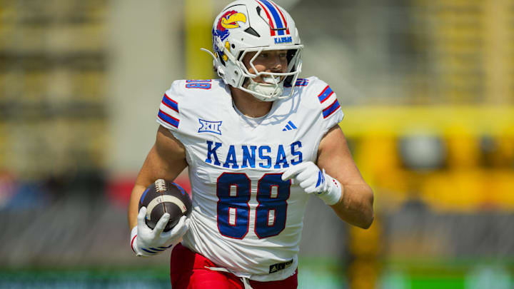 Sep 6, 2025; Columbia, Missouri, USA; Kansas Jayhawks tight end Boden Groen (88) runs with the ball during the first half against the Missouri Tigers at Faurot Field at Memorial Stadium. Mandatory Credit: Jay Biggerstaff-Imagn Images