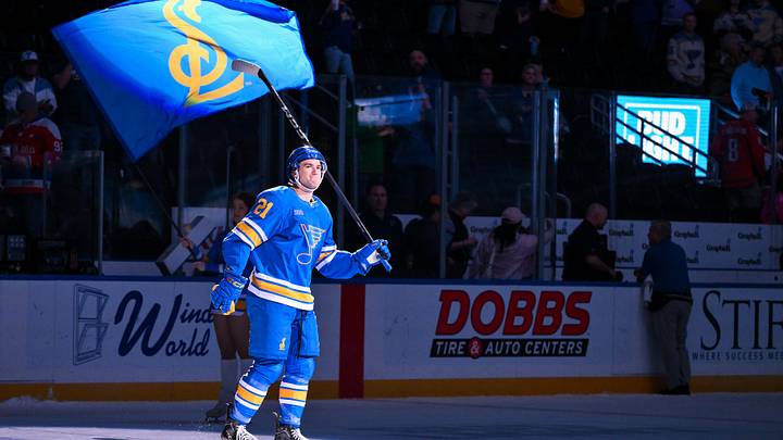 Mar 24, 2026; St. Louis, Missouri, USA; St. Louis Blues right wing Jimmy Snuggerud (21) salutes the fans after he was named second star of the game after a victory over the Washington Capitals at Enterprise Center. Mandatory Credit: Jeff Curry-Imagn Images Mar 24, 2026; St. Louis, Missouri, USA; St. Louis Blues right wing Jimmy Snuggerud (21) salutes the fans after he was named second star of the game after a victory over the Washington Capitals at Enterprise Center. Mandatory Credit: Jeff Curry-Imagn Images