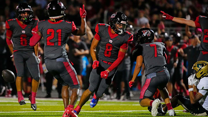 Williams Field linebacker celebrates an interception against Basha during a game at Williams Field High School in Gilbert, on Sept. 12, 2025.