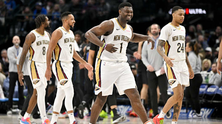 New Orleans Pelicans forward Naji Marshall (8) and guard CJ McCollum (3) and forward Zion Williamson (1) and guard Jordan Hawkins (24) celebrate during the game between the Dallas Mavericks and the New Orleans Pelicans at the American Airlines Center. Mandatory Credit: Jerome Miron-Imagn Images New Orleans Pelicans forward Naji Marshall (8) and guard CJ McCollum (3) and forward Zion Williamson (1) and guard Jordan Hawkins (24) celebrate during the game between the Dallas Mavericks and the New Orleans Pelicans at the American Airlines Center. Mandatory Credit: Jerome Miron-Imagn Images
