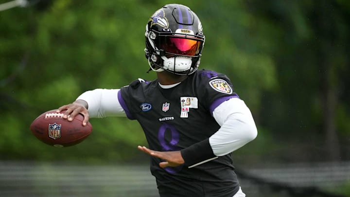 Jul 29, 2022; Owings Mills, MD, USA; Baltimore Ravens quarterback Lamar Jackson (8) practices at the Under Armour Performance Center. Mandatory Credit: Mitch Stringer-Imagn Images