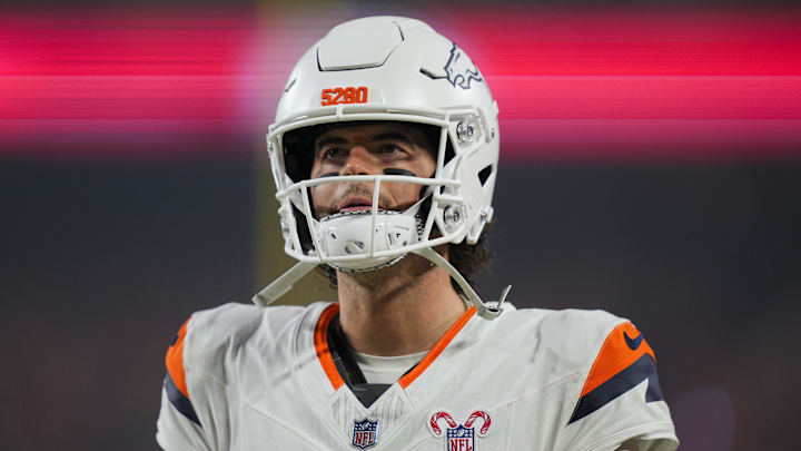 Denver Broncos quarterback Jarrett Stidham (8) prior to a game against the Kansas City Chiefs at GEHA Field at Arrowhead Stadium. 
