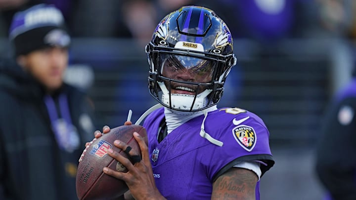 Jan 4, 2025; Baltimore, Maryland, USA; Baltimore Ravens quarterback Lamar Jackson (8) makes a pass during the first quarter against the Cleveland Browns at M&T Bank Stadium. Mandatory Credit: Mitch Stringer-Imagn Images